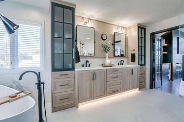 Double vanity bathroom remodel with black accents by home renovations experts in Lincoln, Nebraska